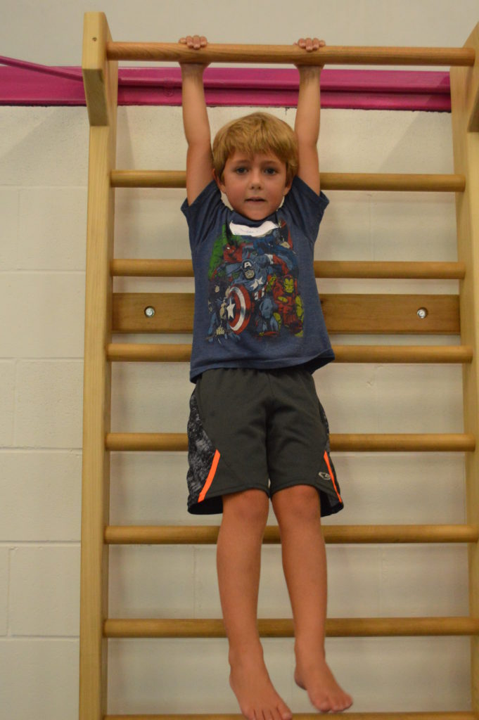 boy doing gymnastics